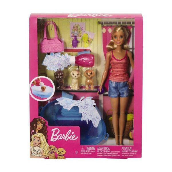 Muñeca Barbie bañando cachorros en bañera rosa con accesorios